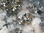 Arsenopyrite in combination with several other minerals.