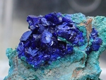 Electric-blue, crystals of azurite on a malachite matrix