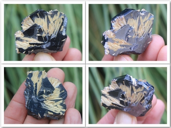Golden rutile crystals on black hematite