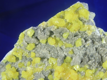 Sulphur crystal on aragonite