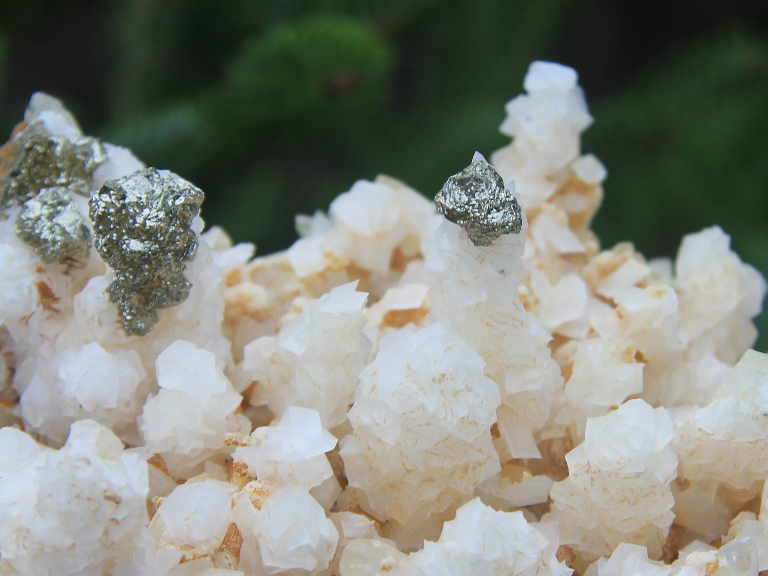 Calcite with pyrite on top