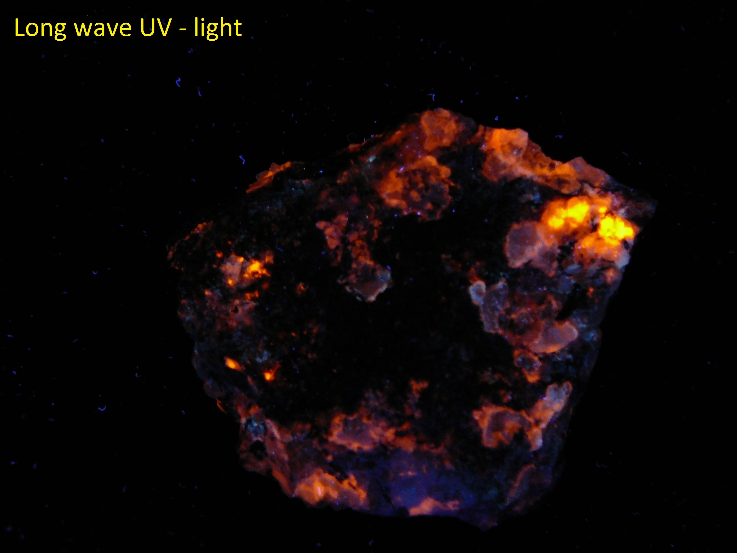 Fluorescent scapolite (rare location)