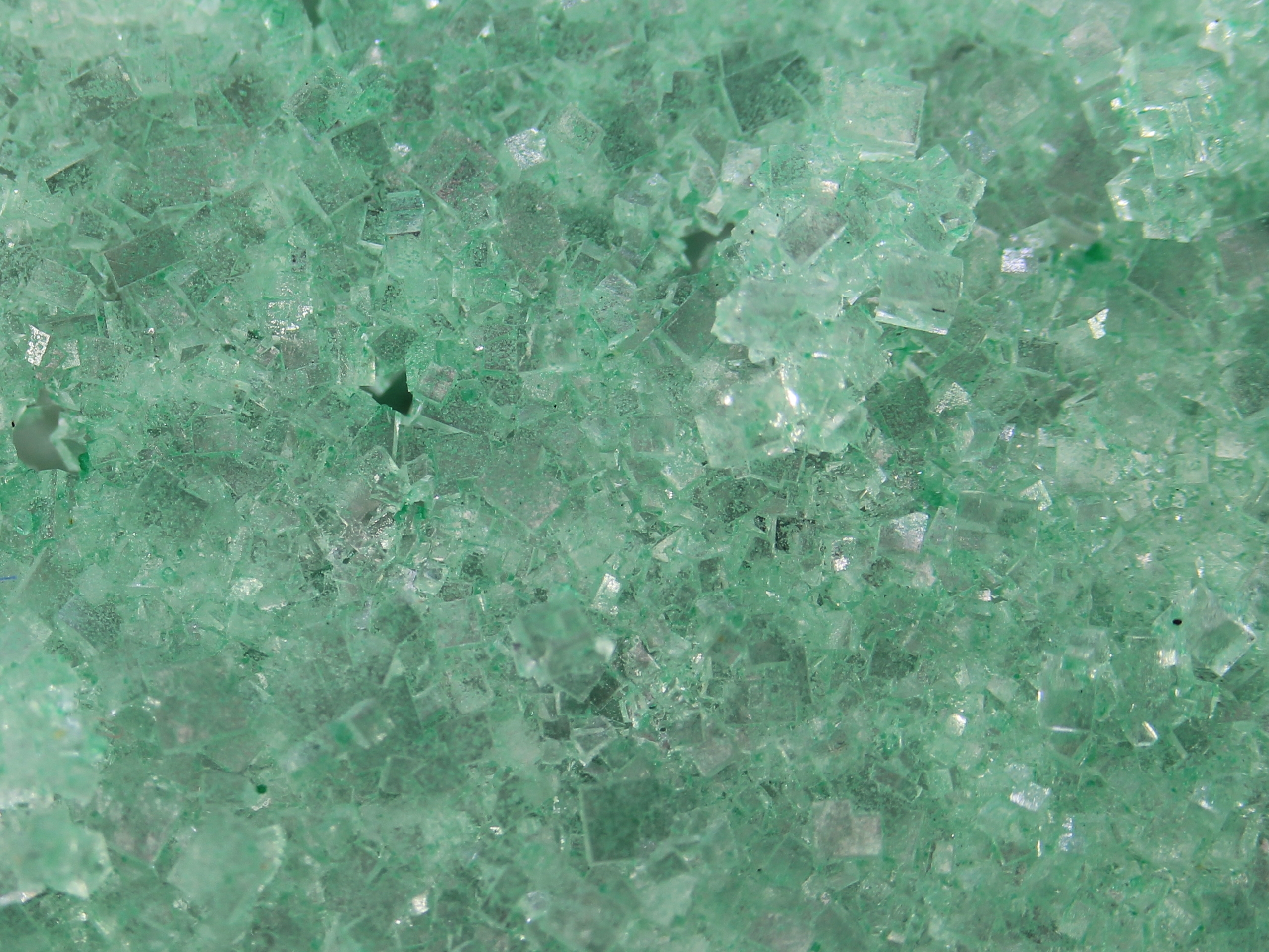 Halite with secondary copper mineral inclusions