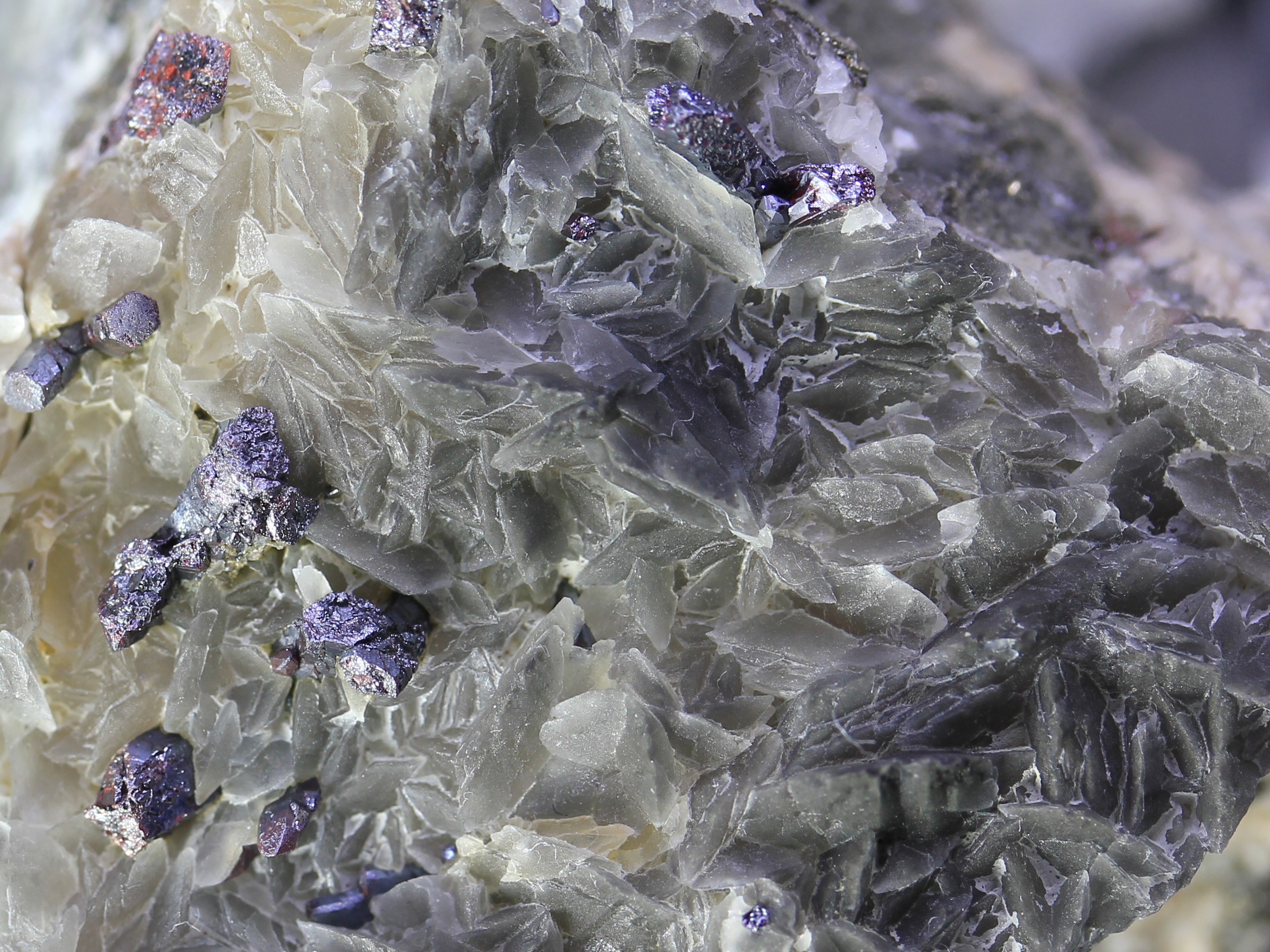 Proustite crystals on a calcite layer